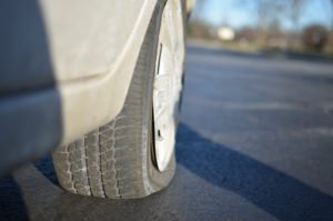 "Getting a Flat Tire" Some rights reserved (CC BY-NC 2.0) by Michael Kappel. Sourced from Flickr